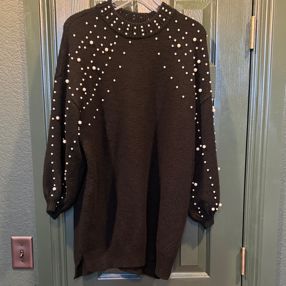 Sweater dress with pearl sleeves